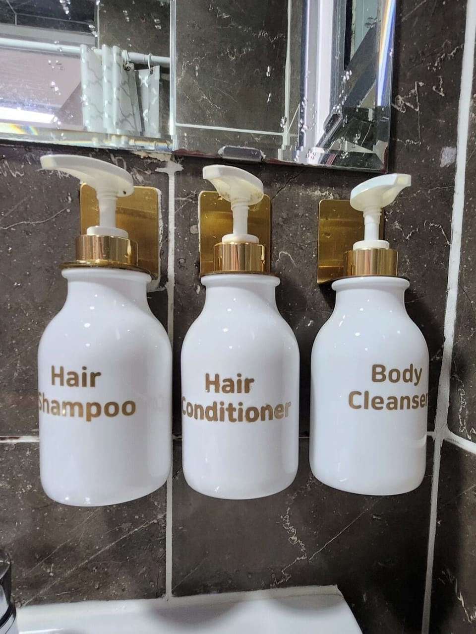 Shower, hair dryer, slippers, towels