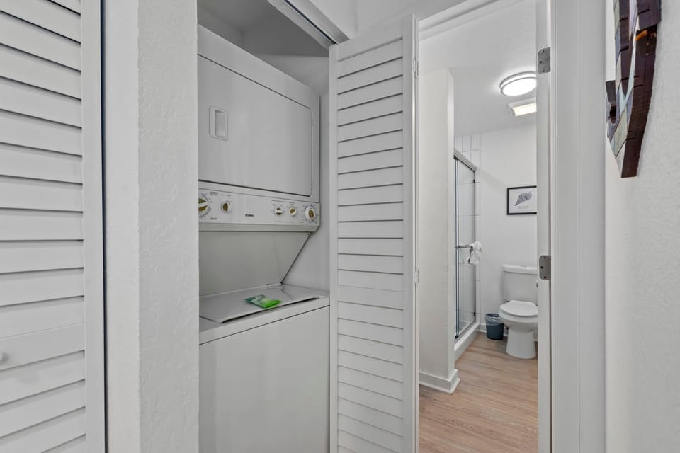 Our laundry area, just off the kitchen, features a convenient stackable washer and dryer, perfect for keeping up with laundry during your stay. No trips to the laundromat required!