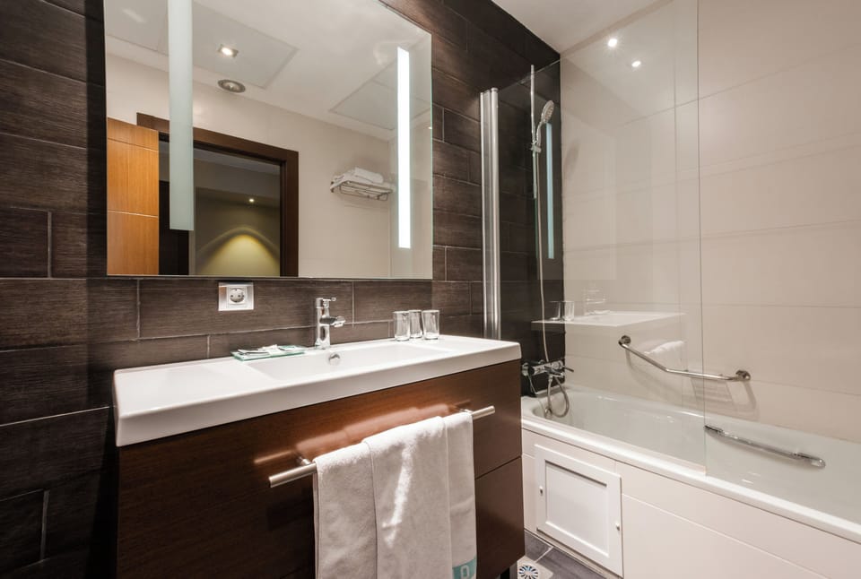 Hair dryer, towels, soap, shampoo