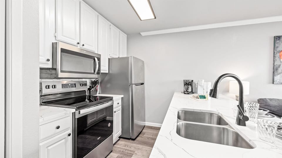 Kitchen with full size stainless appliances