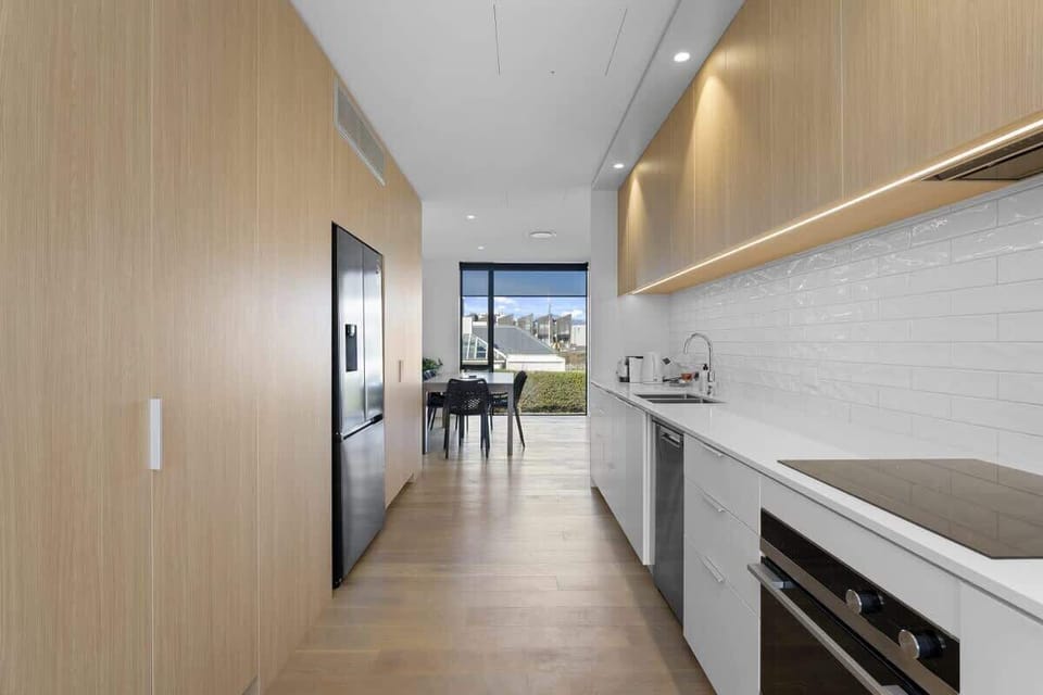 Full kitchen including Nespresso coffee machine.