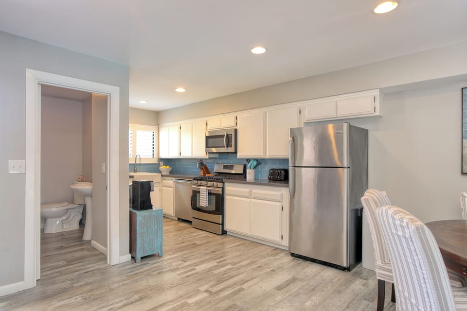With sleek countertops, stainless steel appliances, and plenty of storage, it has everything you need to whip up a delicious meal.