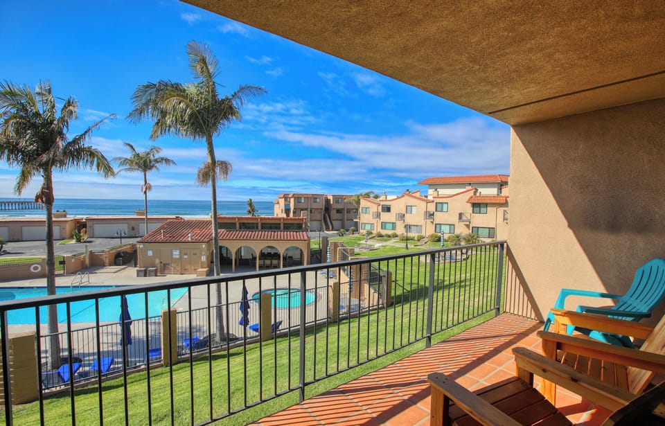 Step out onto the spacious deck right off the living room, where the salty air and coastal charm create the perfect setting for relaxation.