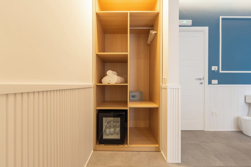 Deluxe Double Room, Balcony, City View | In-room safe, blackout drapes, soundproofing, iron/ironing board