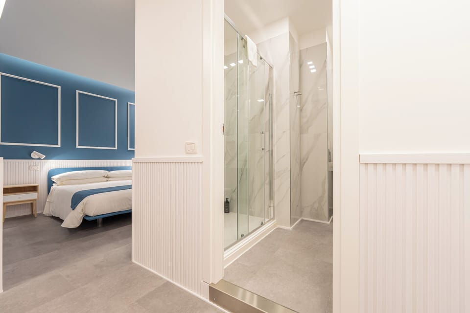 Deluxe Double Room, Balcony, City View | In-room safe, blackout drapes, soundproofing, iron/ironing board