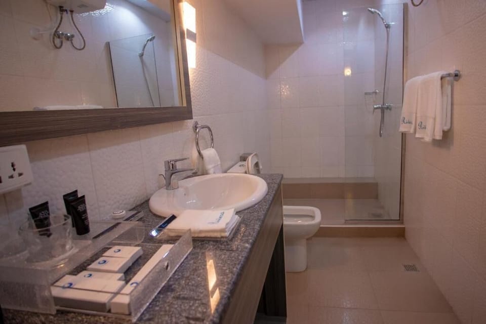 Economy Room, Balcony, City View | Bathroom | Free toiletries, hair dryer, towels, soap