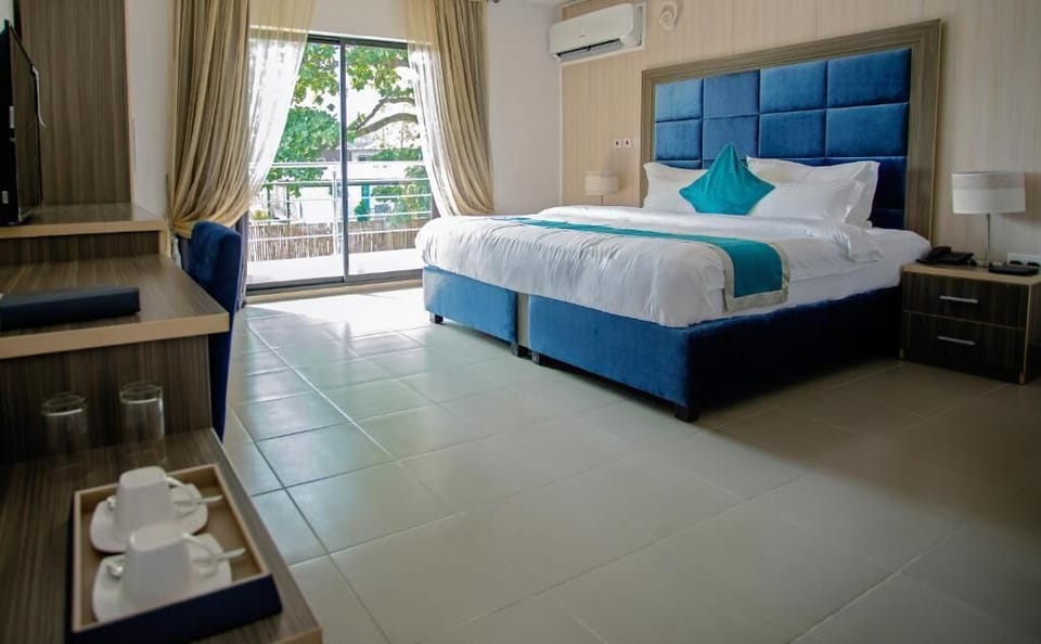 Economy Room, Balcony, City View | Desk, laptop workspace, free WiFi