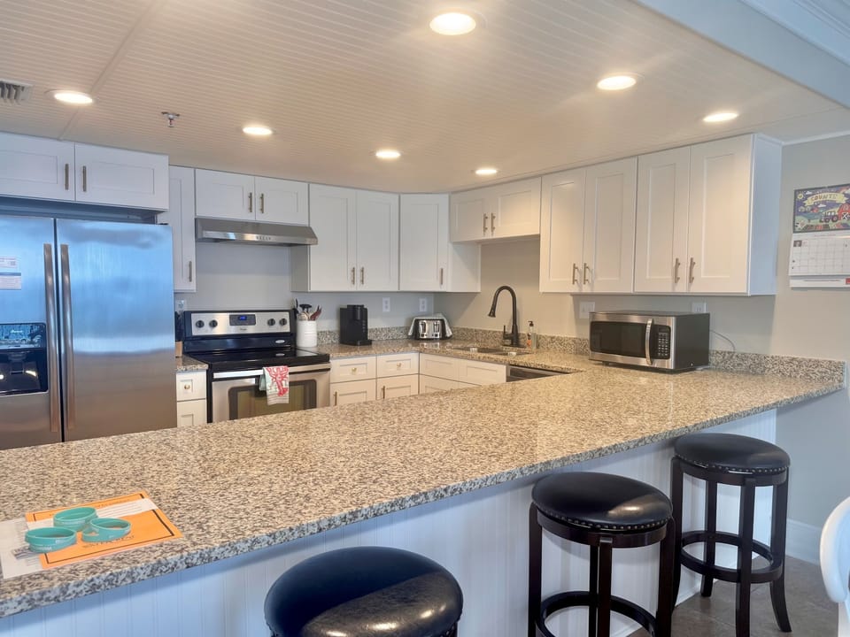 Great Kitchen with Breakfast Bar, also a 6 Top Dining Table