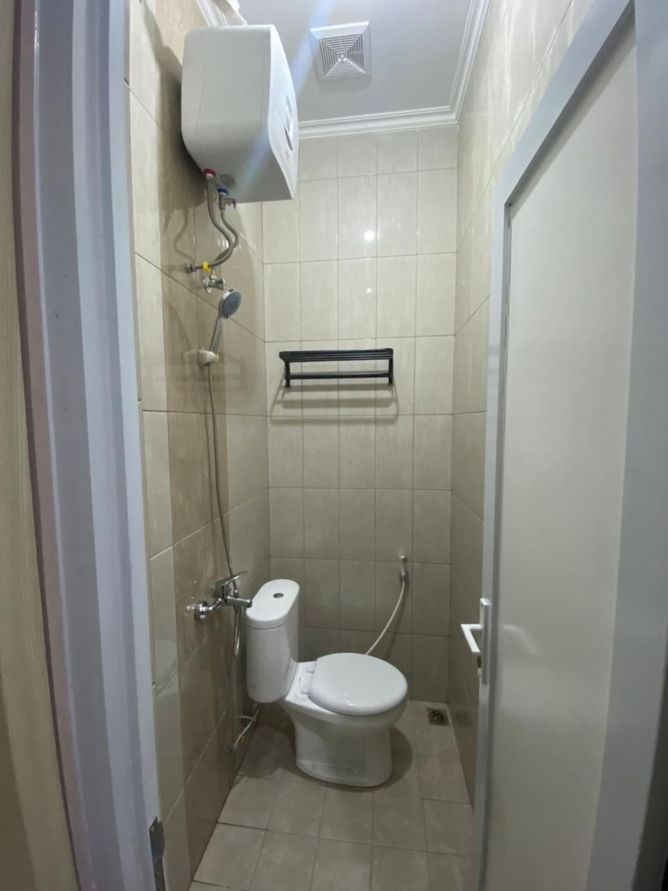 Shower, rainfall showerhead, towels, soap