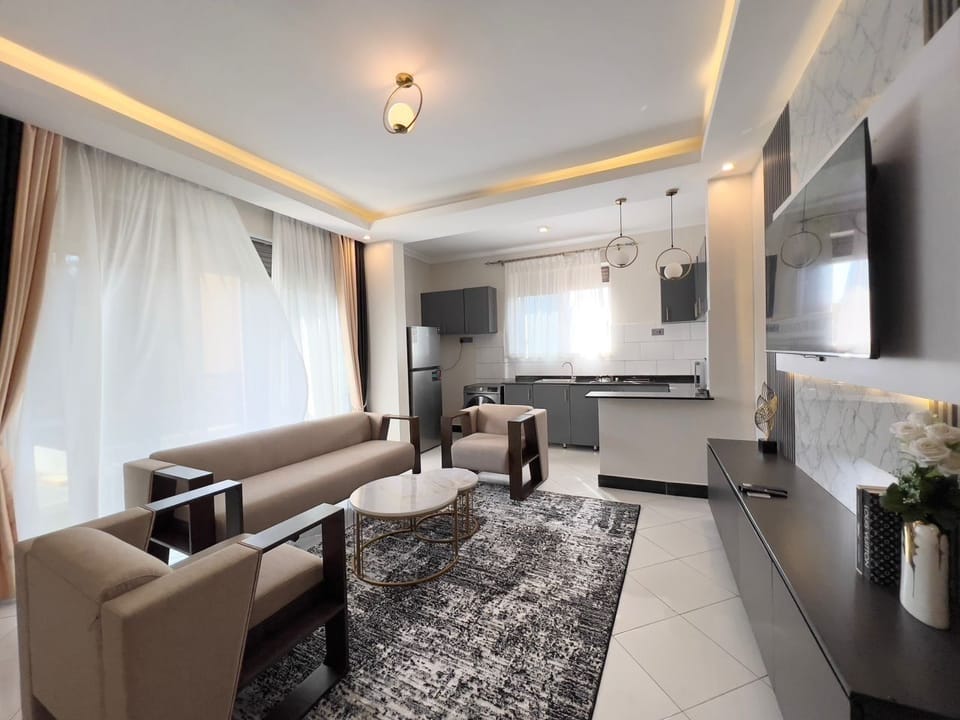 Business Apartment | Living area | TV