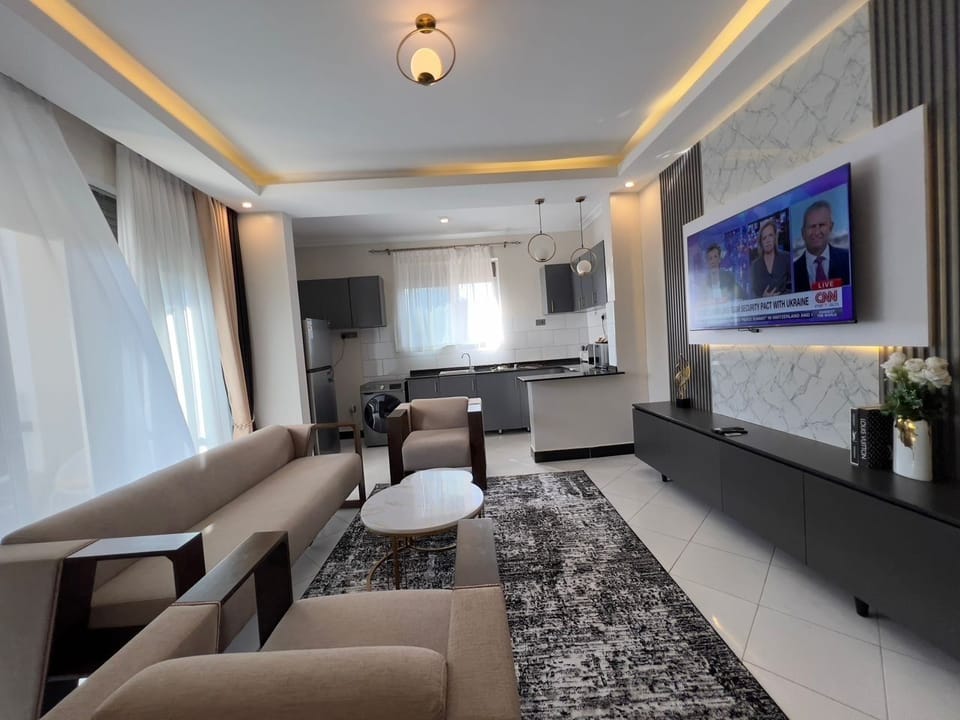 Business Apartment | Living area | TV
