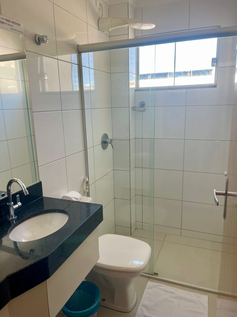 Shower, towels, soap, toilet paper