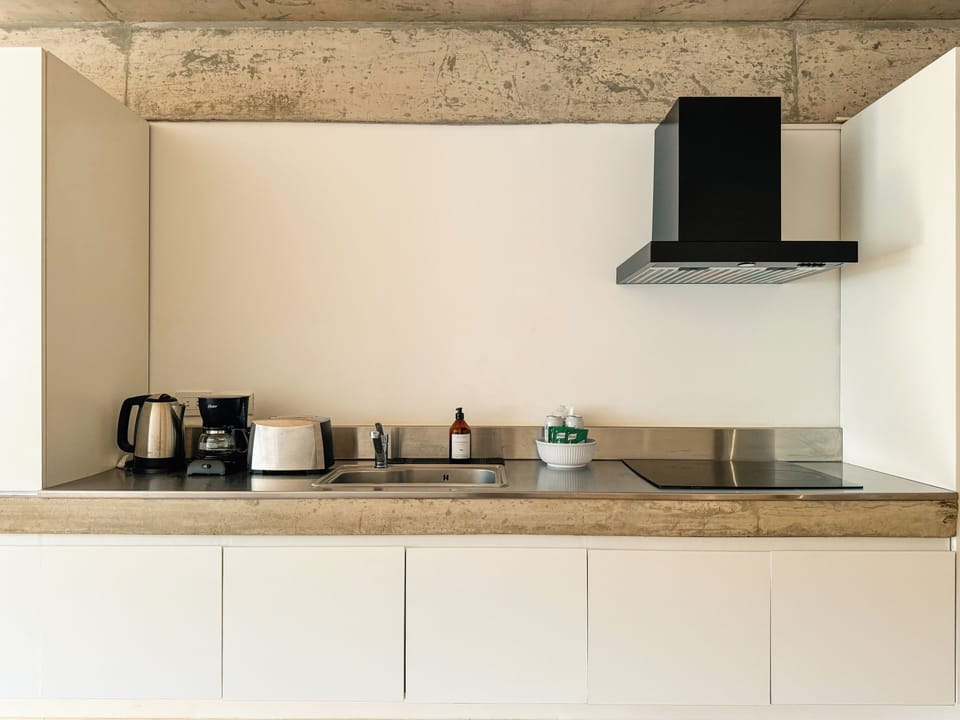Deluxe Studio, Balcony, City View | Private kitchen | Full-size fridge, microwave, oven, stovetop