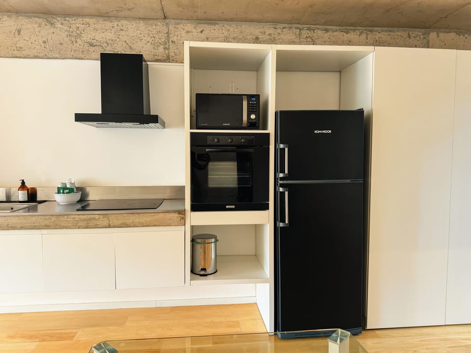Deluxe Studio, Balcony, City View | Private kitchen | Full-size fridge, microwave, oven, stovetop