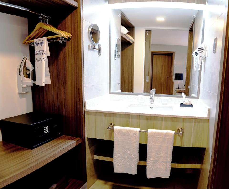 Shower, free toiletries, hair dryer, slippers