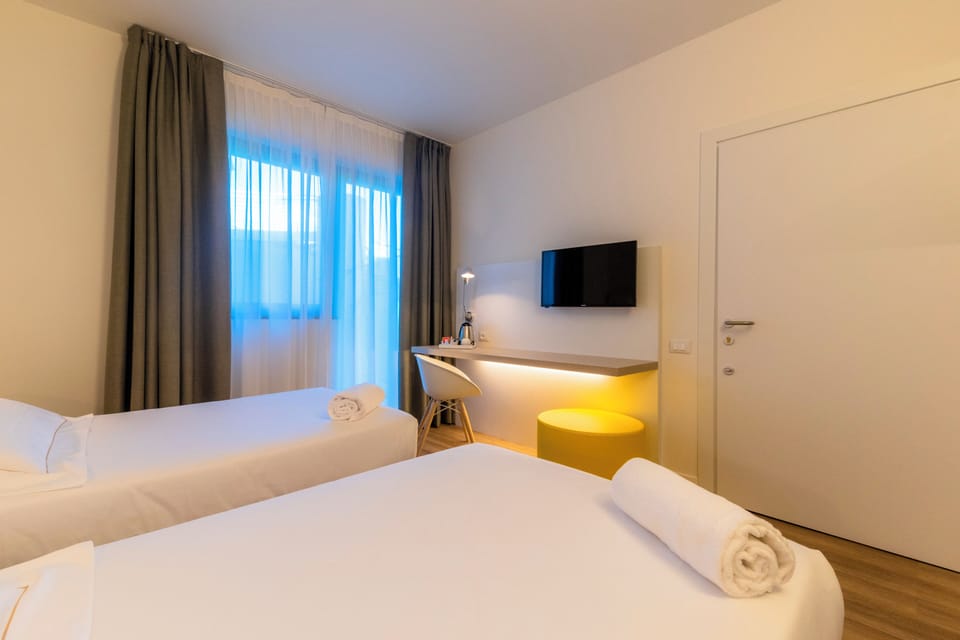 Two connecting double rooms | Minibar, in-room safe, desk, soundproofing