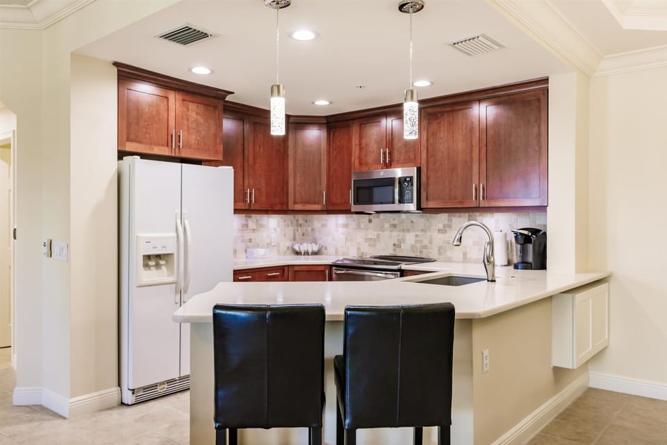 Fully stocked modern kitchen.  