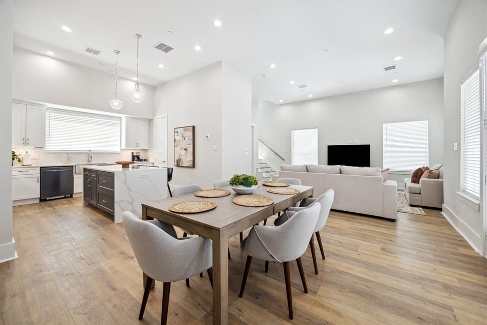 Open-Concept Great Room — Level 2 Living and Dining, High Ceilings, Balcony