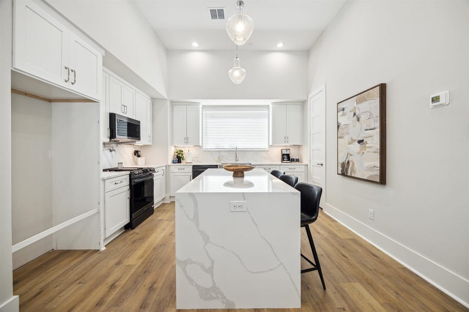 Gourmet Kitchen — Level 2 Full Island View, Open to Dining and Living Area