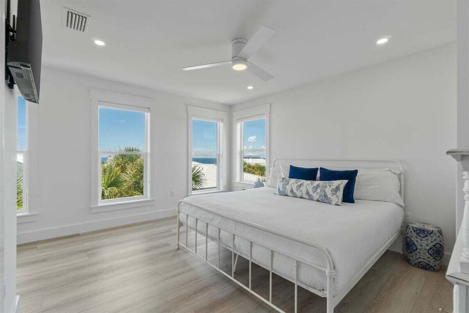 Third floor king suite west has gulf views from bed