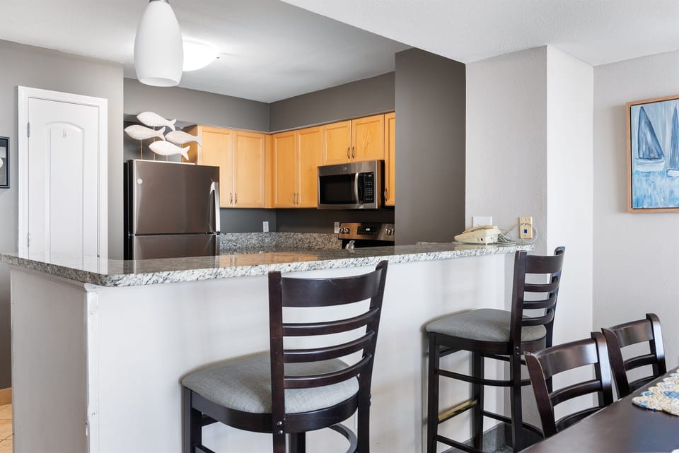 Counter stools by the kitchen