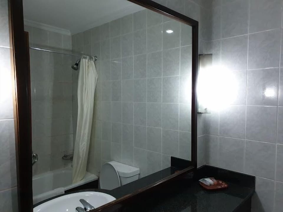 Deluxe Room, Balcony, City View | Bathroom | Free toiletries, hair dryer, towels, soap
