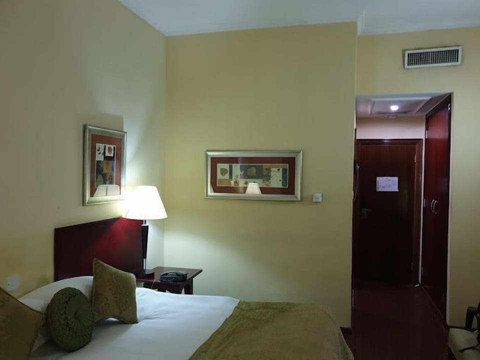 Deluxe Room, Balcony, City View | Desk, laptop workspace, free WiFi
