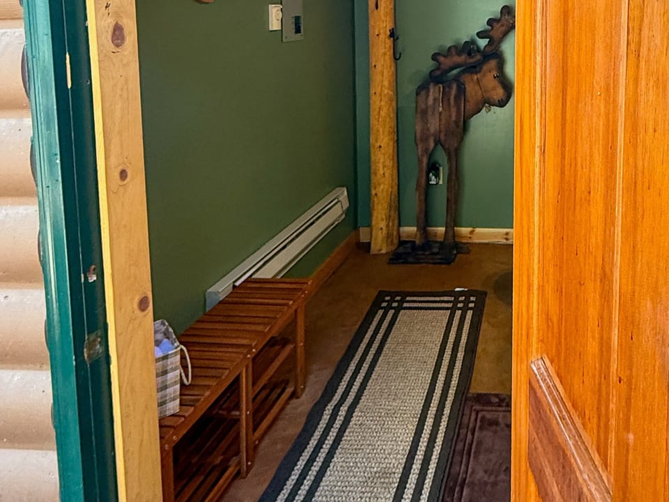 Bathhouse entrance with handy bench