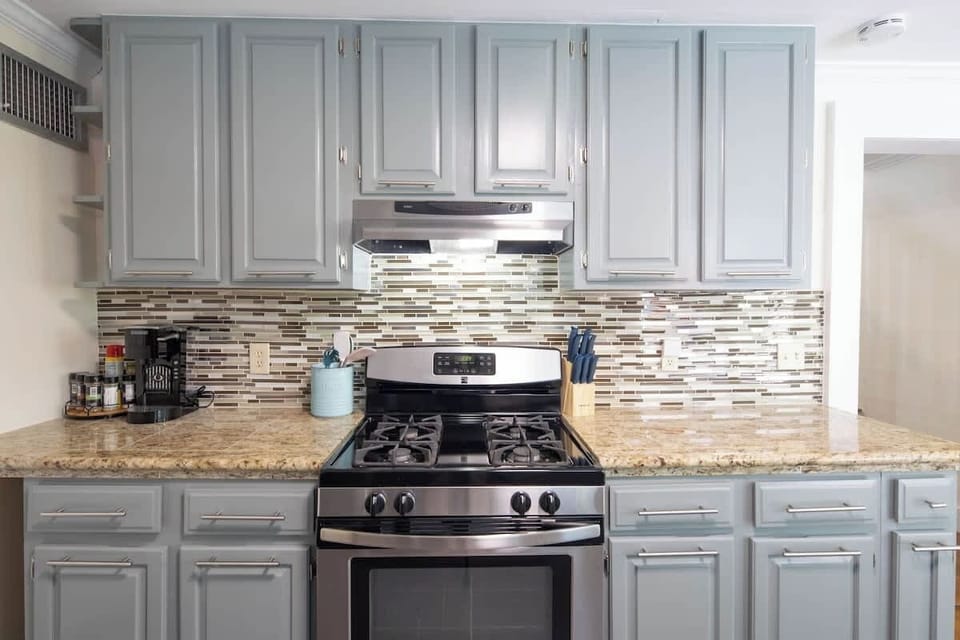 Microwave included (not pictured). Black & Decker coffee maker for K-cups and coffee grounds - some K-cups & sugar provided. Cooking utensils, cooking spray, spices, knife set, scissors, baking pan. 