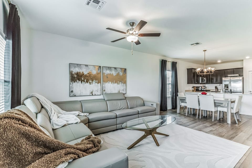 Living room with view of dining room and kitchen