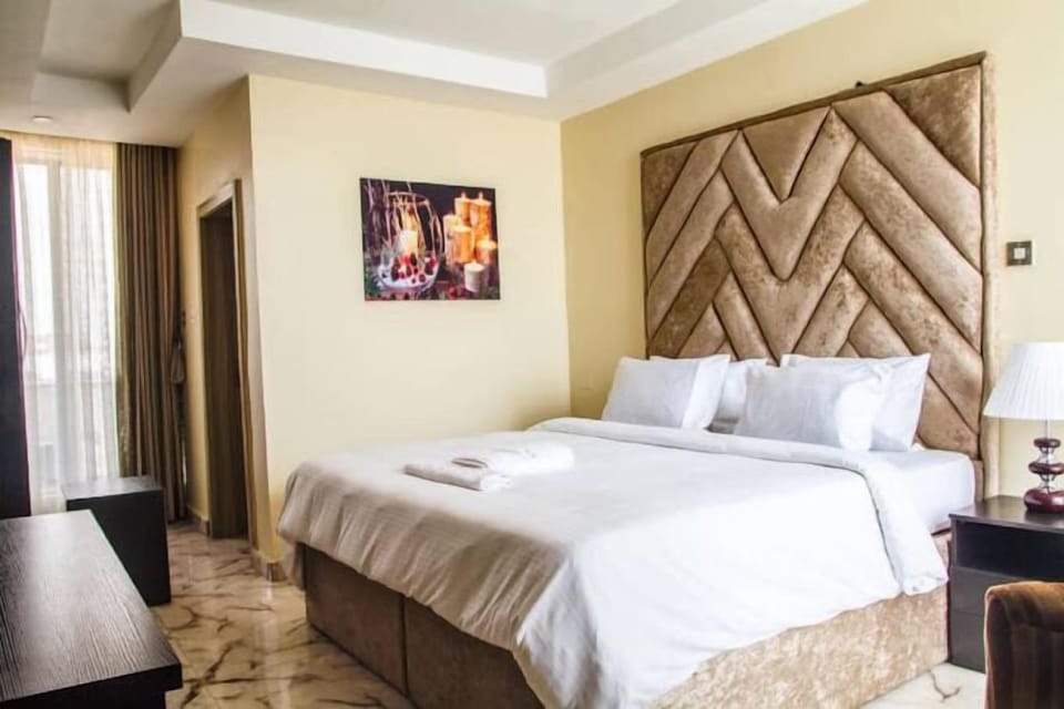 Comfort Room, Balcony, City View | Desk, laptop workspace, free WiFi
