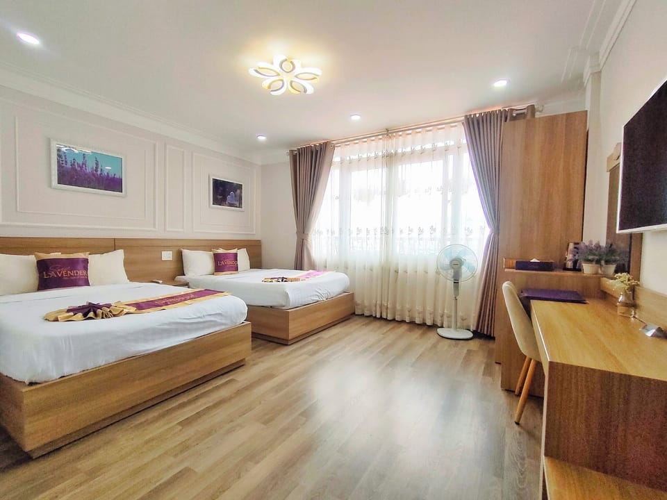 Family Quadruple Room, City View | Desk, laptop workspace, soundproofing, iron/ironing board