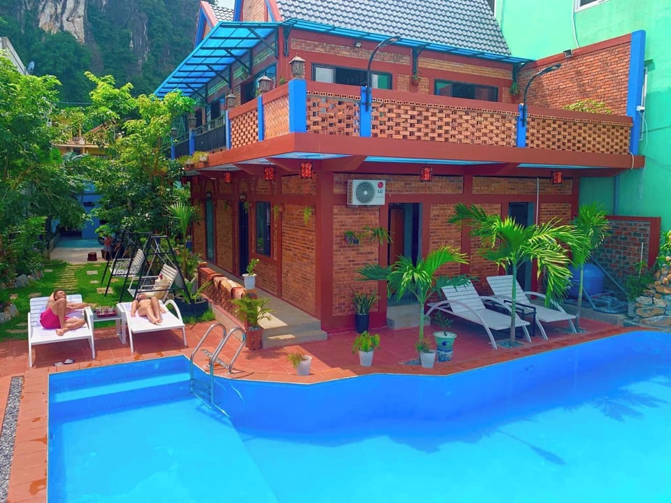 Deluxe Double Room, Pool View | Individually decorated, desk, blackout drapes, soundproofing
