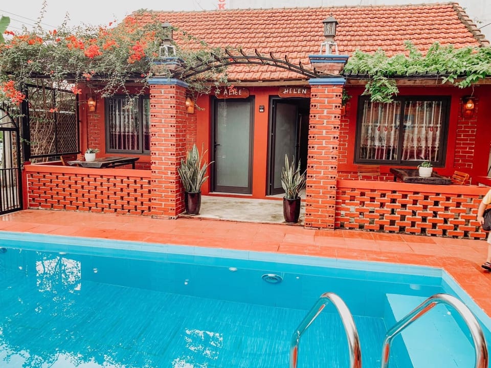 Deluxe Double Room, Pool View | Individually decorated, desk, blackout drapes, soundproofing
