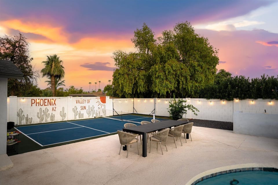 From court to table, experience the perfect evening with a sunset, dining under string lights, and plenty of backyard fun!