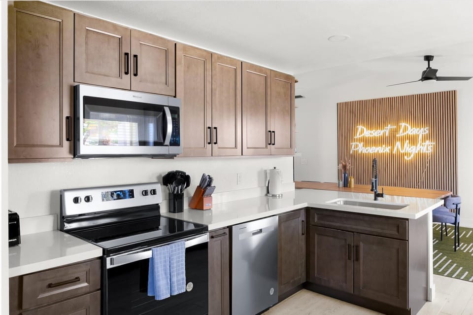 Seamlessly adjacent to the living and dining area