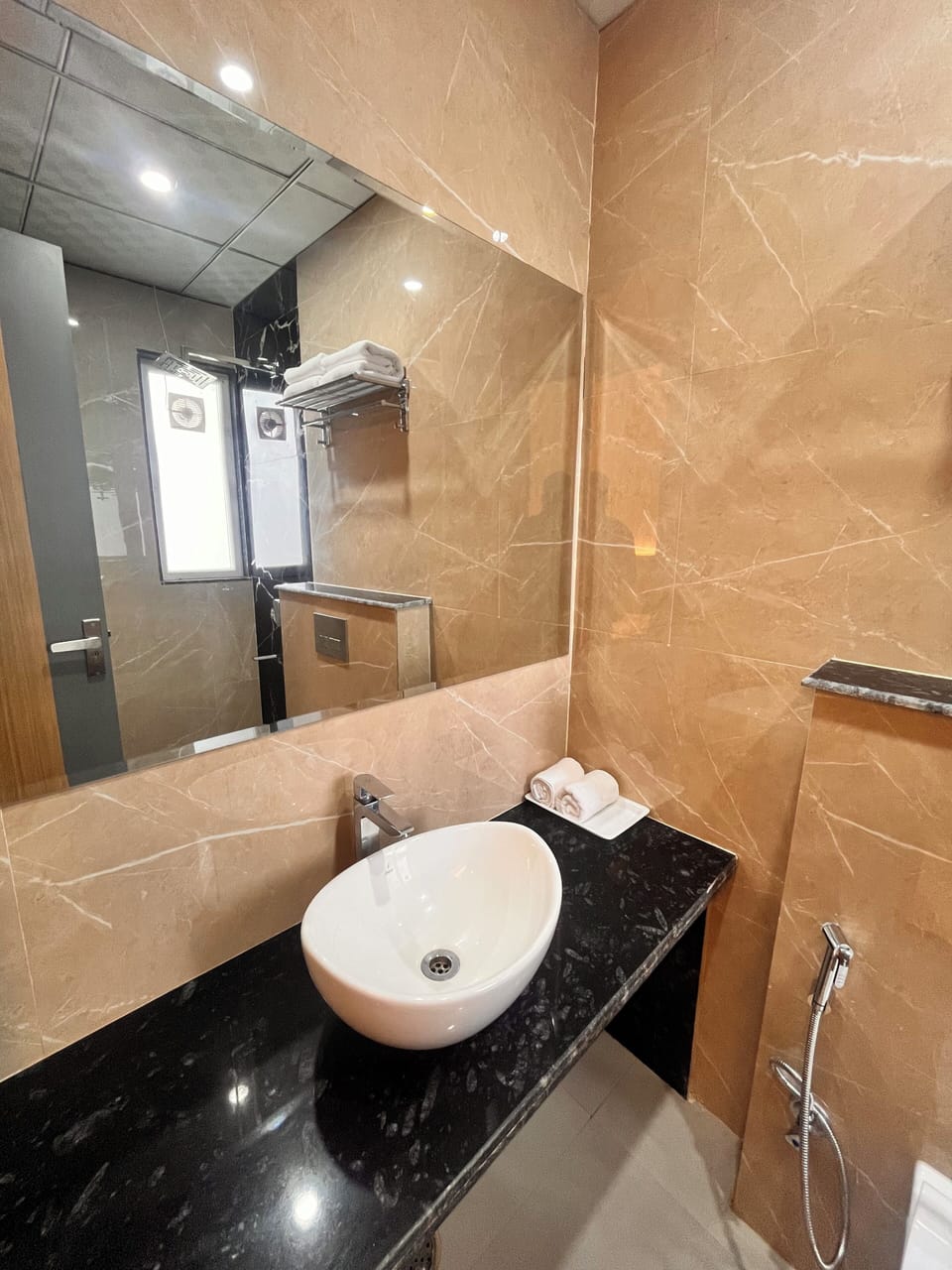 Combined shower/tub, free toiletries, hair dryer, slippers
