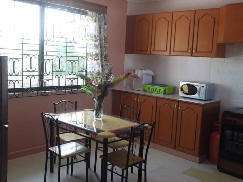 Family Villa, Balcony, Garden View | Private kitchen | Fridge, microwave, cookware/dishes/utensils, dining tables