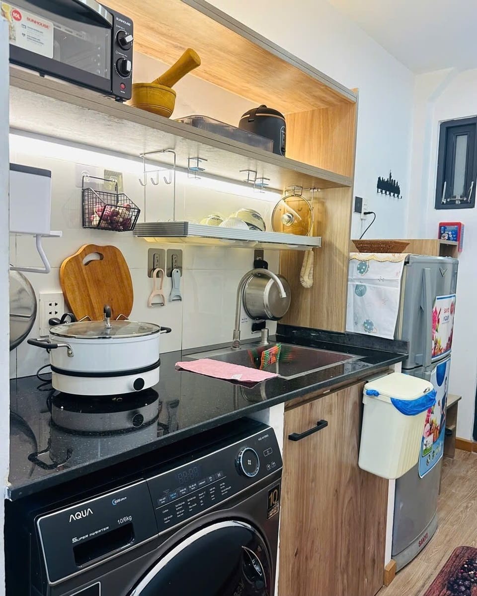 Deluxe Room, 1 King Bed | Private kitchen | Full-size fridge, microwave