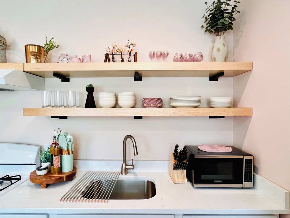[Kitchen Area] A fully equipped kitchen.