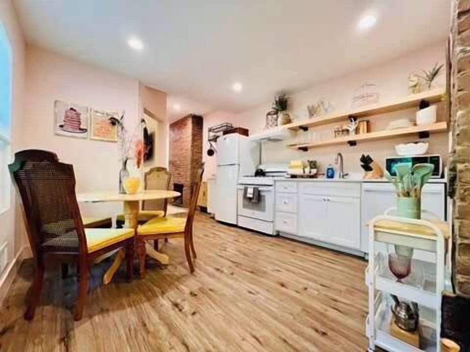 [Dining and Kitchen Area] A full view of combined dining and kitchen area.