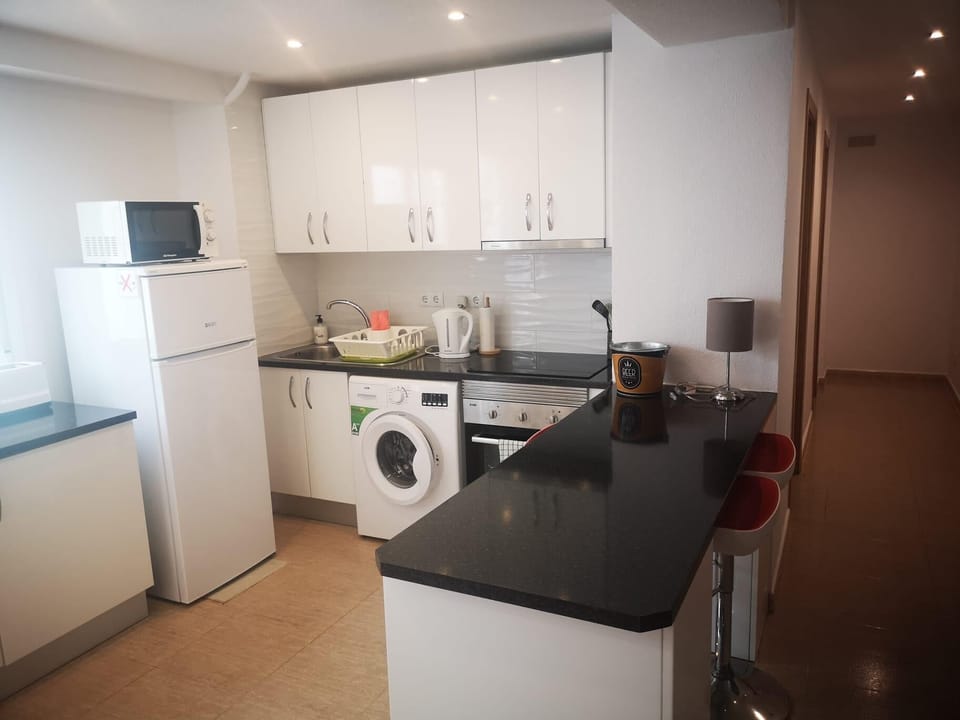 Villa | Private kitchen | Fridge, microwave, oven, stovetop