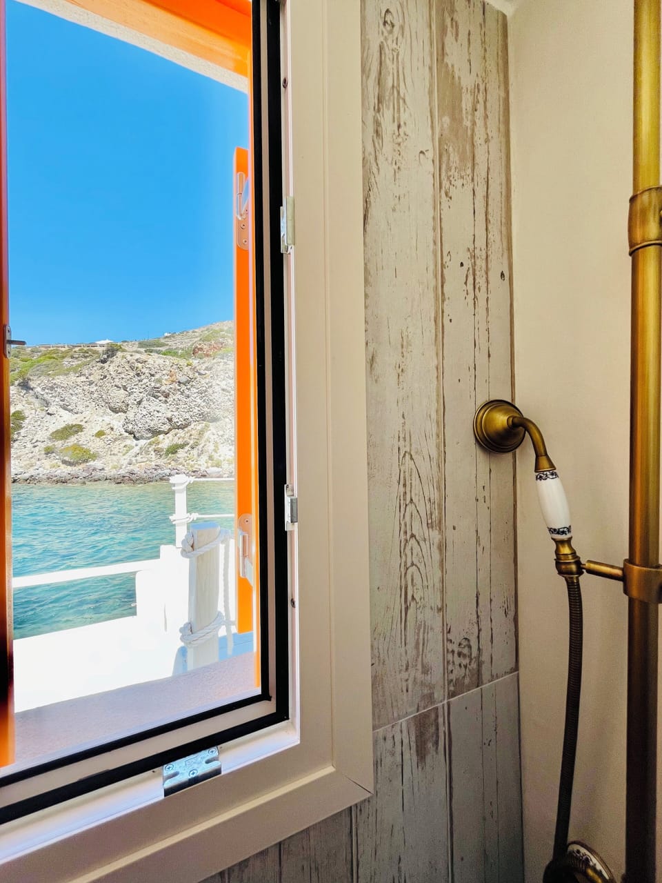 Milos island amazing bathroom by ocean view and Cavo paradiso ochen house 