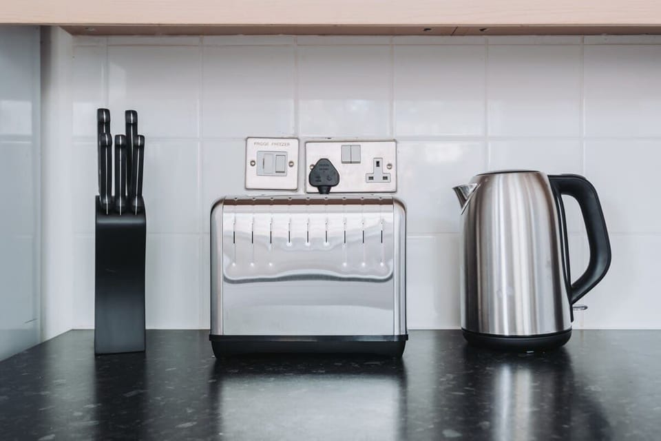A contemporary kitchen offers all the tools and appliances needed for easy home cooking