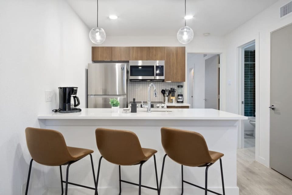 As you take your seat, the dining room's sophisticated design sets the stage for memorable meals and conversations.