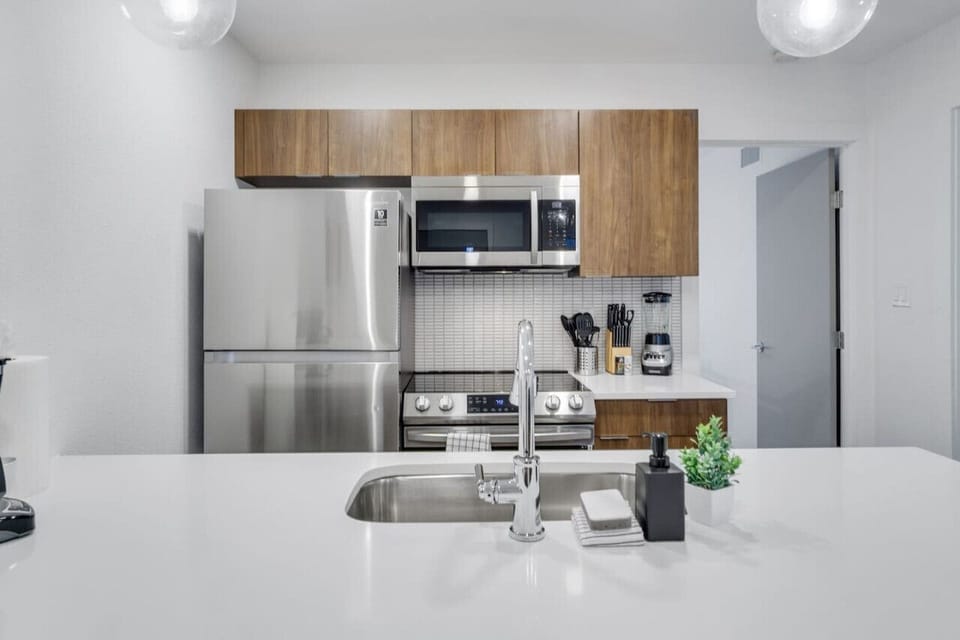 As you step into the kitchen, the clean lines and functional design make you eager to start cooking your favorite dishes.