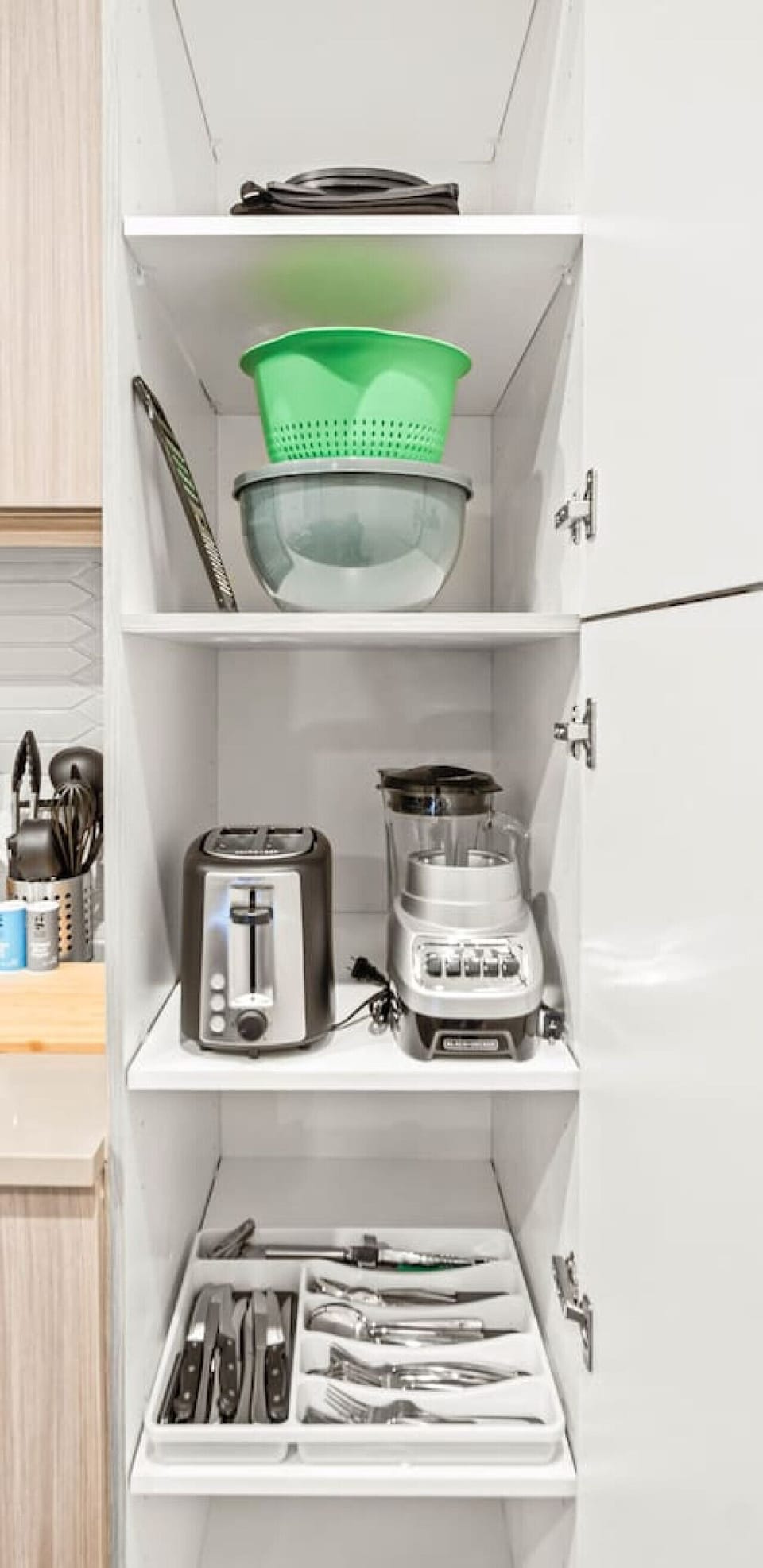 As you open the kitchen, you discover an assortment of coffee pods, and sugar, ensuring you have everything you need for a perfect morning or afternoon pick-me-up.