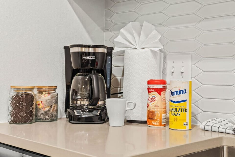 A selection of complimentary in-house consumables, including coffee, tea, and snacks, to make your stay even more enjoyable.