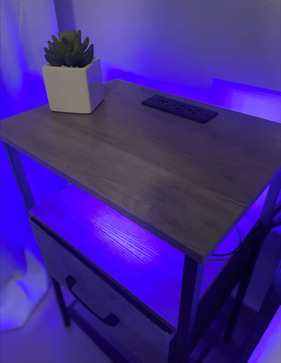 All rooms feature modern nightstands equipped with outlets and USB ports.