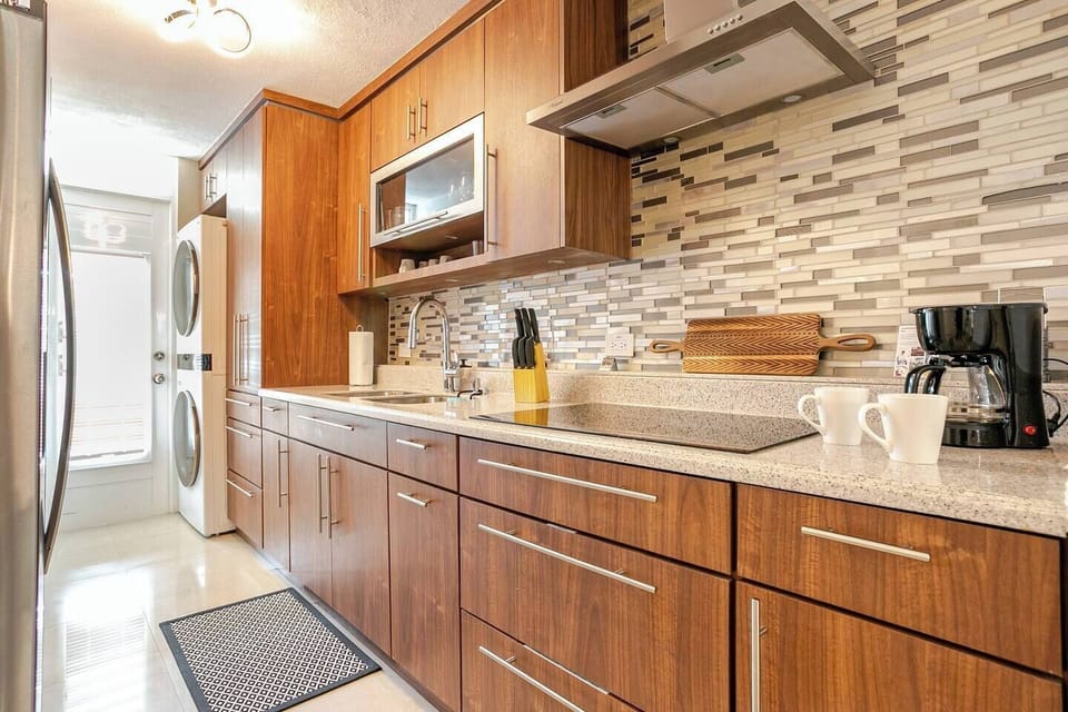 Fully equipped with sandwich press, microwave, air fryer, coffee maker & more! 